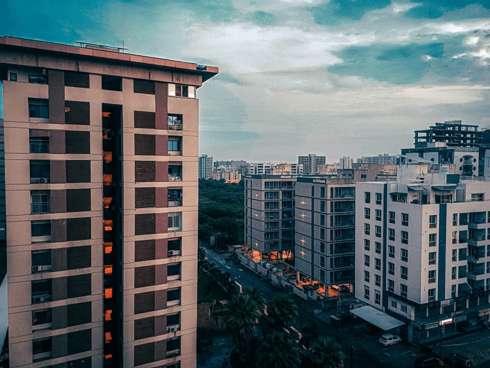 Modern residential apartment towers at dusk
